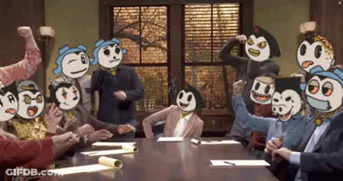 A Group Of People Sitting Around A Table With Nbc On The Bottom GIF