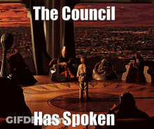 A Group Of People Sitting Around A Table With The Words " The Council Has Spoken " Above Them GIF
