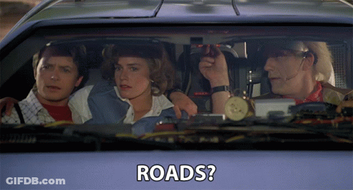 A Group Of People Sitting In A Car With The Words Roads Written On The Side GIF