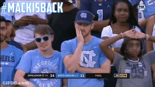 A Group Of People Sitting In A Stadium With The Words Mackisback On The Top GIF