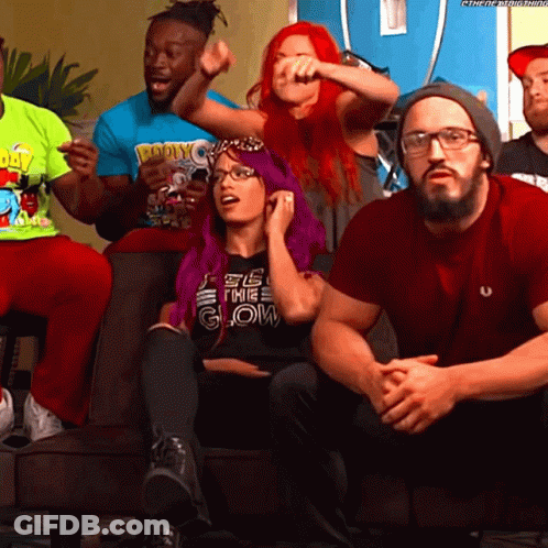 A Group Of People Sitting On A Couch With One Wearing A T-Shirt That Says ' Ecg ' GIF