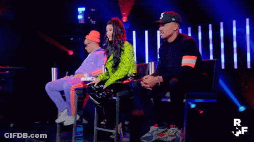 A Group Of People Sitting On A Stage With The Letters Rf On The Bottom GIF