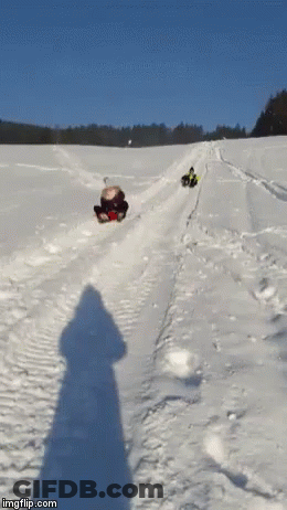 A Group Of People Sledding Down A Snowy Hill With Imgflip.com At The Bottom Of The Image GIF