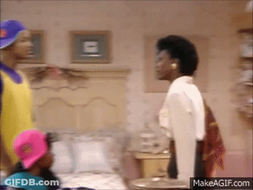 A Group Of People Standing Around A Bed With A Makeagif.com Watermark GIF