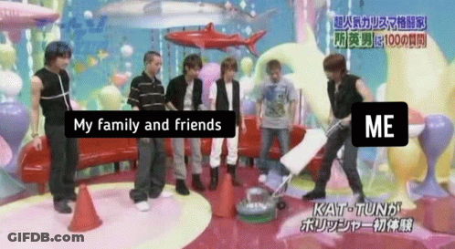A Group Of People Standing Around A Vacuum Cleaner With The Words " My Family And Friends " On The Screen GIF
