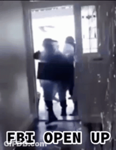 A Group Of People Standing In A Doorway With The Words Fbi Open Up Written On The Bottom . GIF