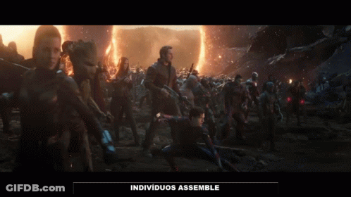 A Group Of People Standing In A Field With The Words Individuos Assemble Written On The Bottom GIF