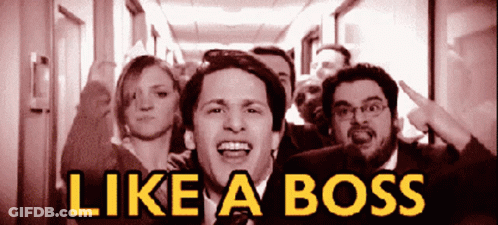 A Group Of People Standing In A Hallway With The Words Like A Boss GIF