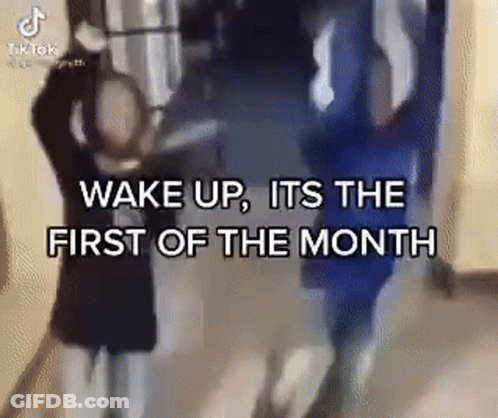 A Group Of People Standing In A Hallway With The Words `` Wake Up , It 'S The First Of The Month '' GIF