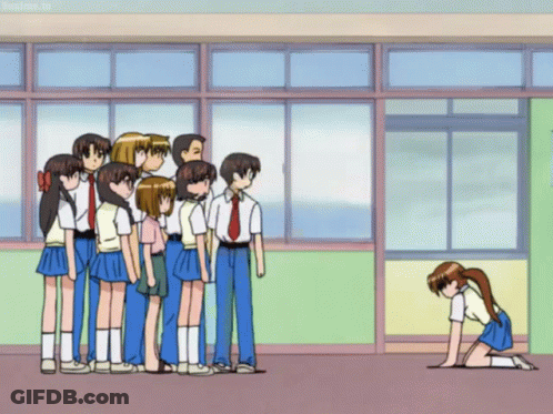 A Group Of People Standing In A Line With One Girl Kneeling Down In Front Of Them GIF