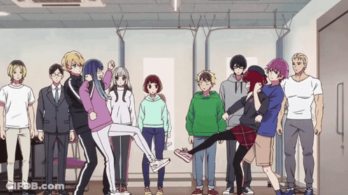 A Group Of People Standing In A Room With One Girl Holding Another Girl 'S Leg GIF