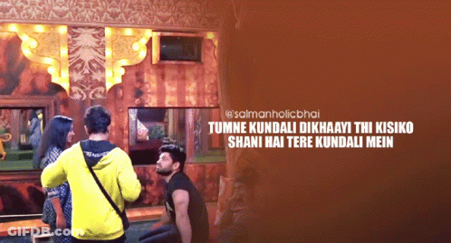 A Group Of People Standing In A Room With The Words Tumne Kundali Dikhaayi Thi Kisiko Shani Hai Tere Kundali Mein GIF
