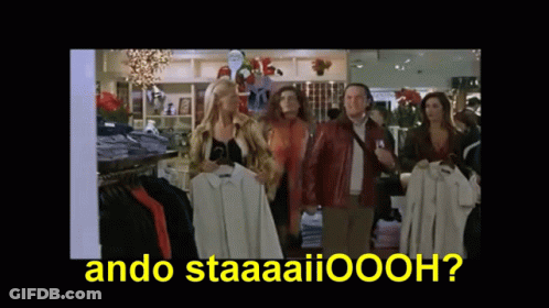 A Group Of People Standing In A Store With The Words " Ando Staaaaiioooh " On The Bottom GIF