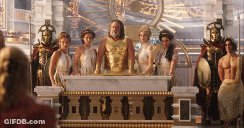 A Group Of People Standing In Front Of A Marble Altar With A Chinese Symbol On The Bottom GIF