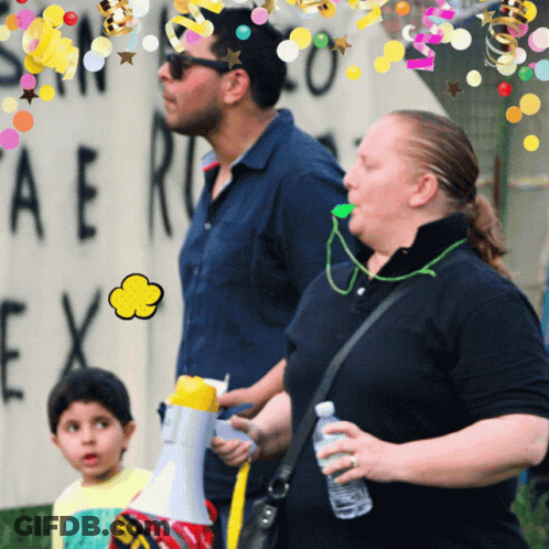 A Group Of People Standing In Front Of A Sign That Says " Ae " On It GIF