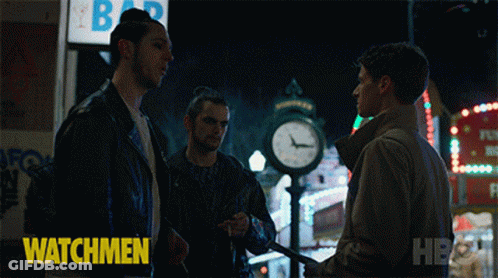 A Group Of People Standing In Front Of A Sign That Says Crack On It GIF
