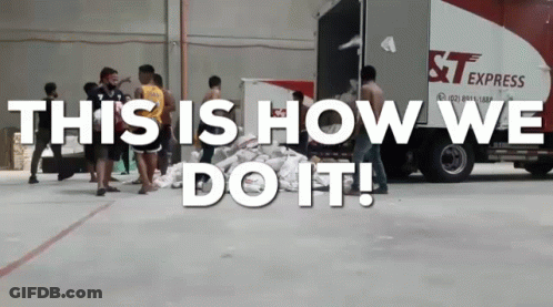 A Group Of People Standing In Front Of A Truck That Says St Express GIF