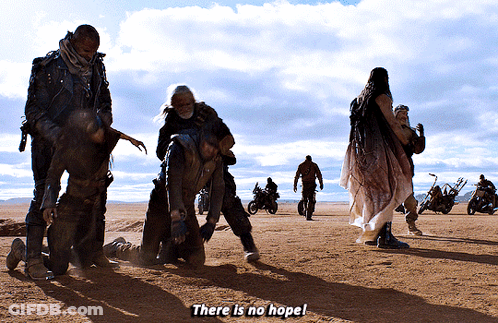 A Group Of People Standing In The Desert With The Words " There Is No Hope " GIF