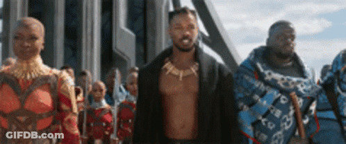 A Group Of People Standing Next To Each Other In A Line . GIF