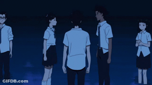 A Group Of People Standing Next To Each Other With A Man Standing In The Middle GIF