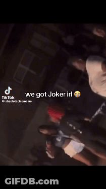 A Group Of People Standing Next To Each Other With The Caption " We Got Joker Irl " On The Bottom GIF