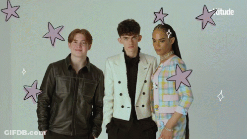 A Group Of People Standing Next To Each Other With The Word Attitude On The Bottom Right GIF