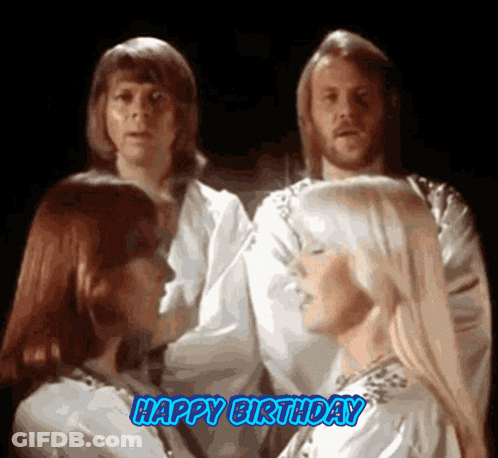 A Group Of People Standing Next To Each Other With The Words Happy Birthday Written In Blue GIF