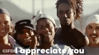 A Group Of People Standing Next To Each Other With The Words `` I Appreciate You '' On The Bottom . GIF
