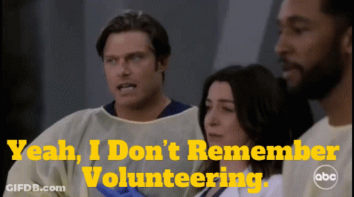 A Group Of People Standing Next To Each Other With The Words Yeah I Do N't Remember Volunteering GIF