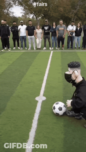 A Group Of People Standing On A Soccer Field With The Hashtag #Fairs On The Bottom GIF