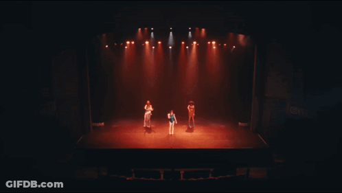 A Group Of People Standing On A Stage In Front Of A Sign That Says ' Cnn ' On It GIF