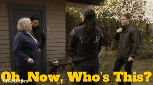 A Group Of People Standing Outside Of A House With The Words Oh Now Who 'S This On The Bottom GIF