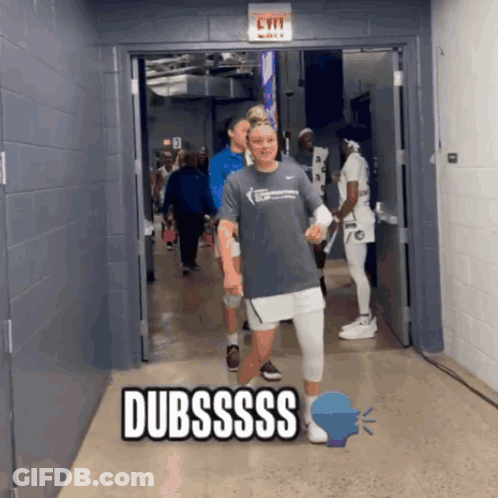 A Group Of People Walking Down A Hallway With The Word Dubssss On The Bottom GIF