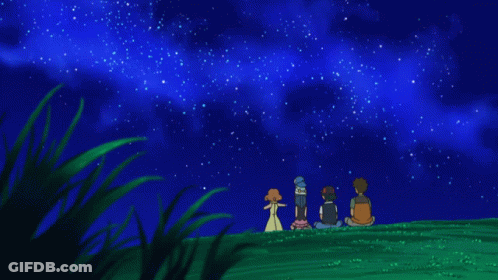 A Group Of People Watching A Shooting Star In The Sky GIF