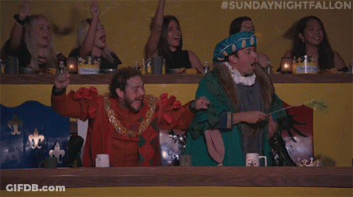 A Group Of People Watching A Sunday Night Fallon GIF