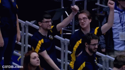 A Group Of People Wearing Blue And Yellow Shirts With The Letters Vc On Them GIF