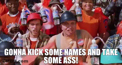 A Group Of People Wearing Helmets With Water Bottles On Top Of Them . GIF