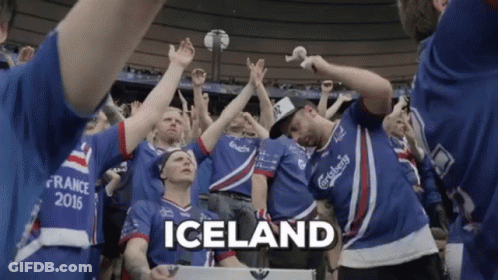 A Group Of People Wearing Iceland Jerseys Are Dancing GIF