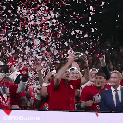 A Group Of People Wearing Red Shirts That Say Texas GIF