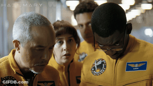 A Group Of People Wearing Yellow Uniforms With A Patch That Says Oliver On It GIF