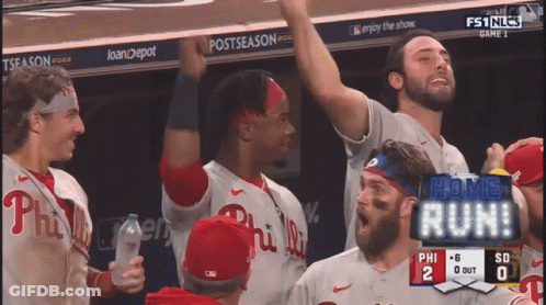 A Group Of Philadelphia Phillies Baseball Players Celebrate A Home Run GIF