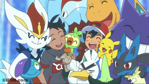 A Group Of Pokemon Are Posing For A Picture With A Boy Wearing A Shirt That Says A On It GIF