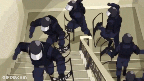 A Group Of Police Officers Running Down Stairs GIF
