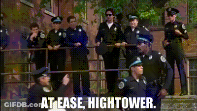 Police Officers Standing On Balcony GIF