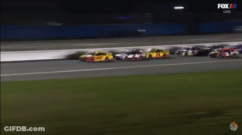 A Group Of Race Cars Are Racing On A Track Sponsored By Fox Live GIF
