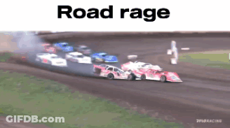 A Group Of Race Cars On A Dirt Track With The Words Road Rage Written Above Them GIF