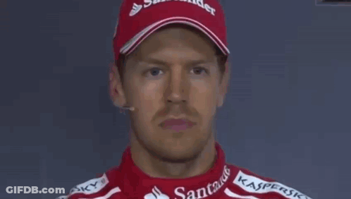A Group Of Racing Drivers Are Standing In Front Of A Sign That Says " Don T Believe That " GIF