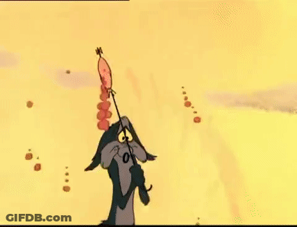 A Group Of Red Blood Cells Are Floating In The Air On A Yellow Background . GIF