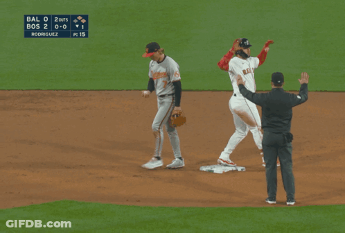A Group Of Red Sox Baseball Players Standing In The Dugout GIF