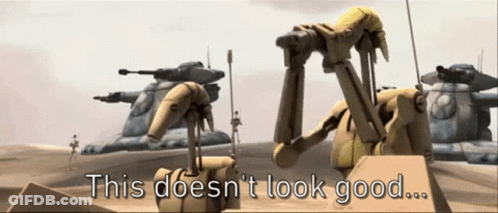 A Group Of Robots Standing Next To Each Other With The Words " This Does N't Look Good " Above Them GIF
